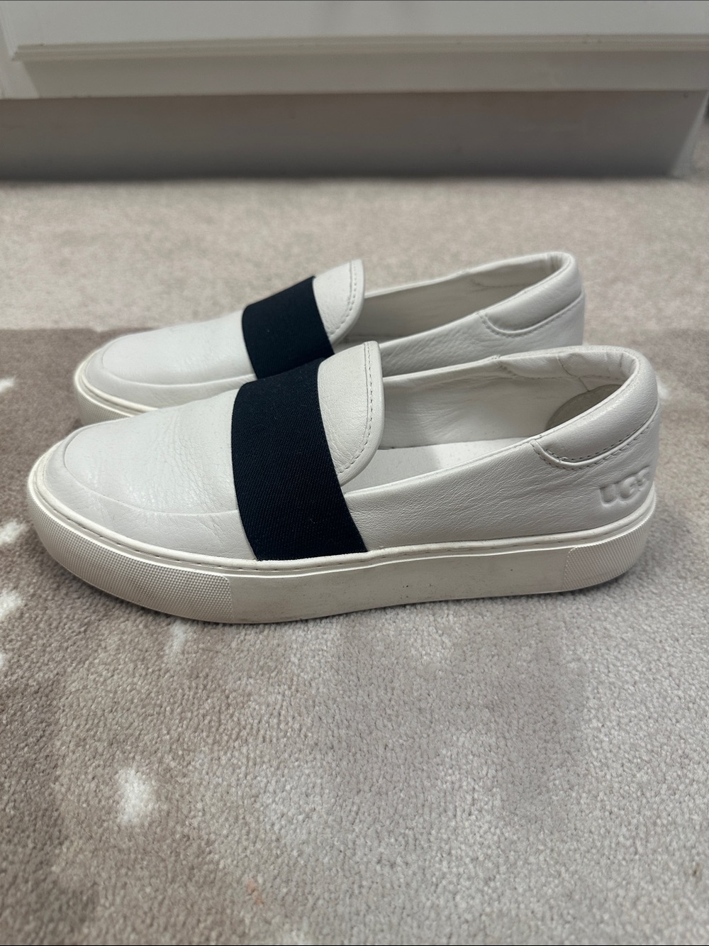 UGG White Leather Slip-Ons with Black Elastic Band